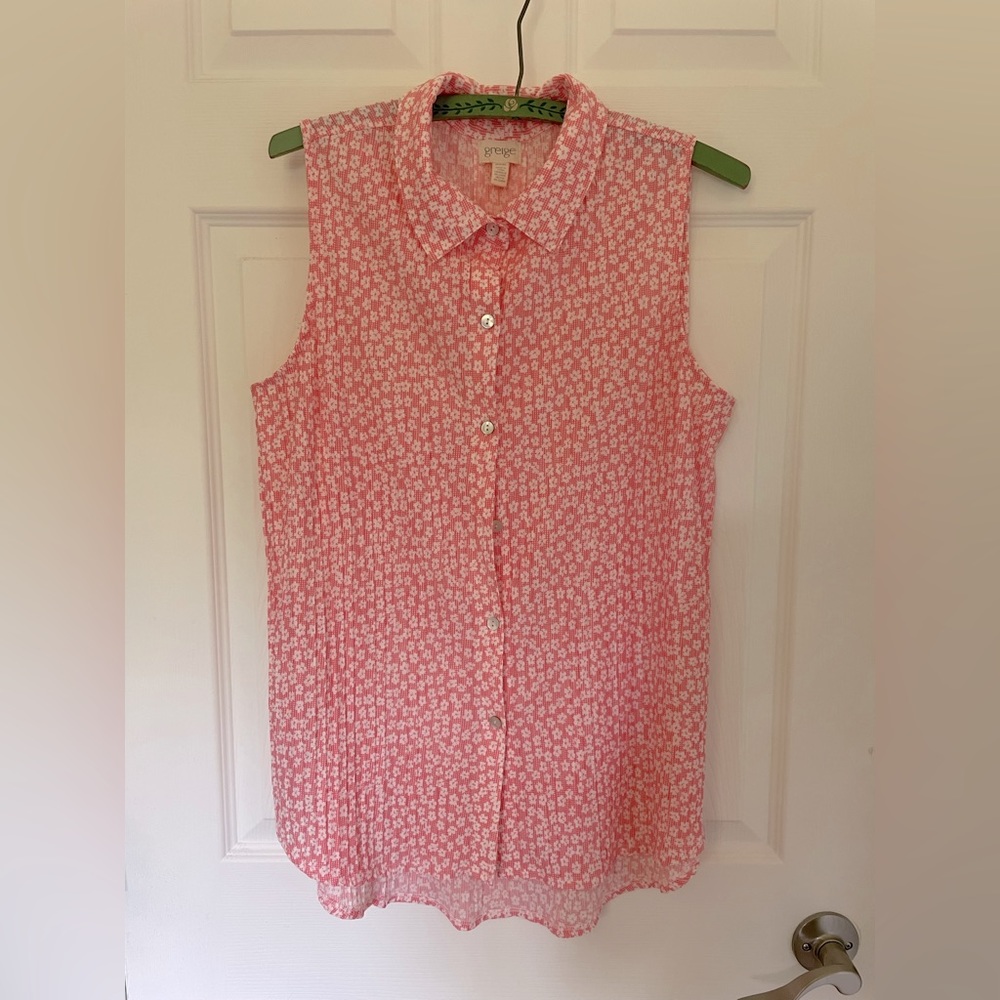Sleeveless blouse, drop hem